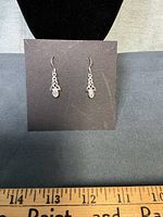 front view of earrings on display card