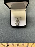 Pendant in presentation box front view