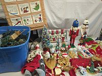 Overall view of lot showing lights tote, wall hanging, tree, nutcrackers, stockings, ornaments