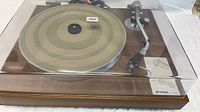 Overall view of Yamaha YP-450 turntable with dust cover closed