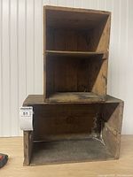 Stacked view of both Dominion Canners wooden crates showing overall form