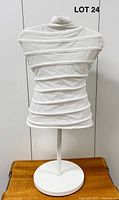 Front view of adjustable children’s clothes stand with cover