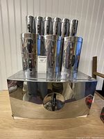 Bread box with canisters and spice tins displayed