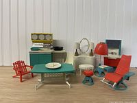 Full set of doll furniture pieces arranged together