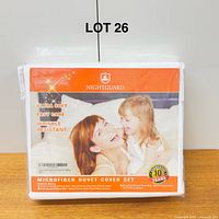 Front of packaged Nightguard microfiber duvet cover set