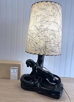 Full view of lamp with shade showing overall form and condition