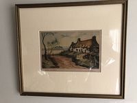 Full view of framed aquatint on wall