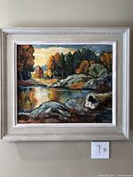 Front view of framed oil landscape painting