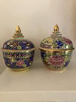 Front view of both Banjarong trinket boxes showing size and designs