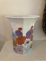 Front view of Rosenthal polygon vase showing floral design and flared rim