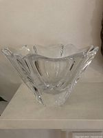 Side view showing star-shaped flared crystal bowl