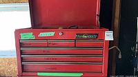 Overall view of red Mastercraft tool chest with lid open
