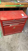 Front view of red Waterloo tool chest showing two drawers, lower compartment, decals and general wear