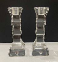 Front view of both wavy crystal candlesticks