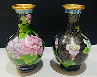 Front view of both cloisonné vases showing floral designs