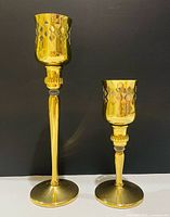Both candlestick holders assembled showing height difference