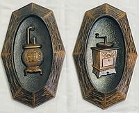 Front view of both plaques showing designs and frames