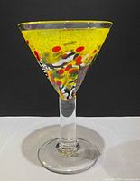 Full view of goblet upright showing bowl coloration and stem