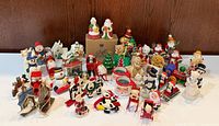 Wide view of all unboxed ornaments and figurines on table