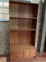 Full view of bookshelf with four drawers