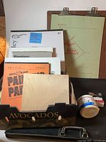 Group shot showing portfolio, drawing board, pads, canvases, gesso