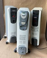 All three portable oil-filled radiator heaters on casters