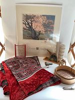 Group shot showing poster, textile, abacus, camel, teapot, bird, steamer and column