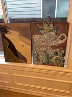 Both paintings side by side showing overall view