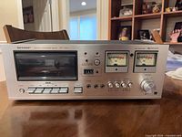 Front perspective of Sharp RT-1155 deck showing full panel