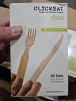 Front of Clickeat Duo box showing fork and knife, 50 sets info