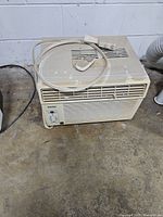 Full view of Danby window air conditioner on floor