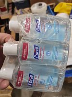 Shrink-wrapped 3-pack of Purell Advanced hand sanitizer