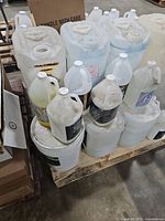 Pallet of mixed plastic jugs and carboys