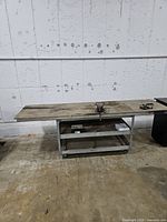 Full view of rolling workbench against wall