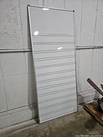 Front view showing full board with ruled sections