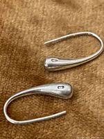 Front view of both sterling silver teardrop hook earrings