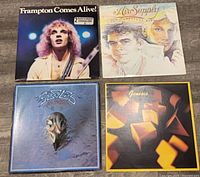 Four album covers arranged for identification