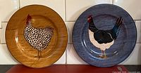 Overview of both Hen and Rooster Sakura plates side by side