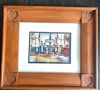 Full view of framed print and wood frame with carved hearts
