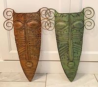 Front view of both masks showing design and colours