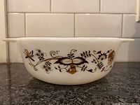 Side profile of Pyrex casserole showing full pattern