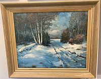 Full view of framed winter landscape painting