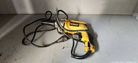Full view of DeWalt DW268 screwdriver with cord