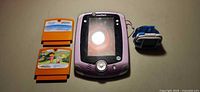 LeapPad2 tablet, LeapFrog watch, two VTech cartridges