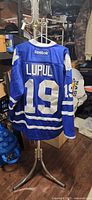 Back of jersey showing LUPUL and 19