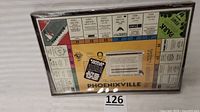 Front view of sealed Game of Phoenixville showing full board in shrink wrap