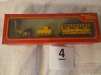 Closed box front showing window and contents