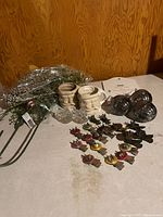 Group view showing mugs, cheese dome, floral picks, clamps, ornaments