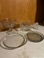 Group of four glass pieces on countertop