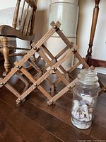 Wine rack and Planters jar side by side